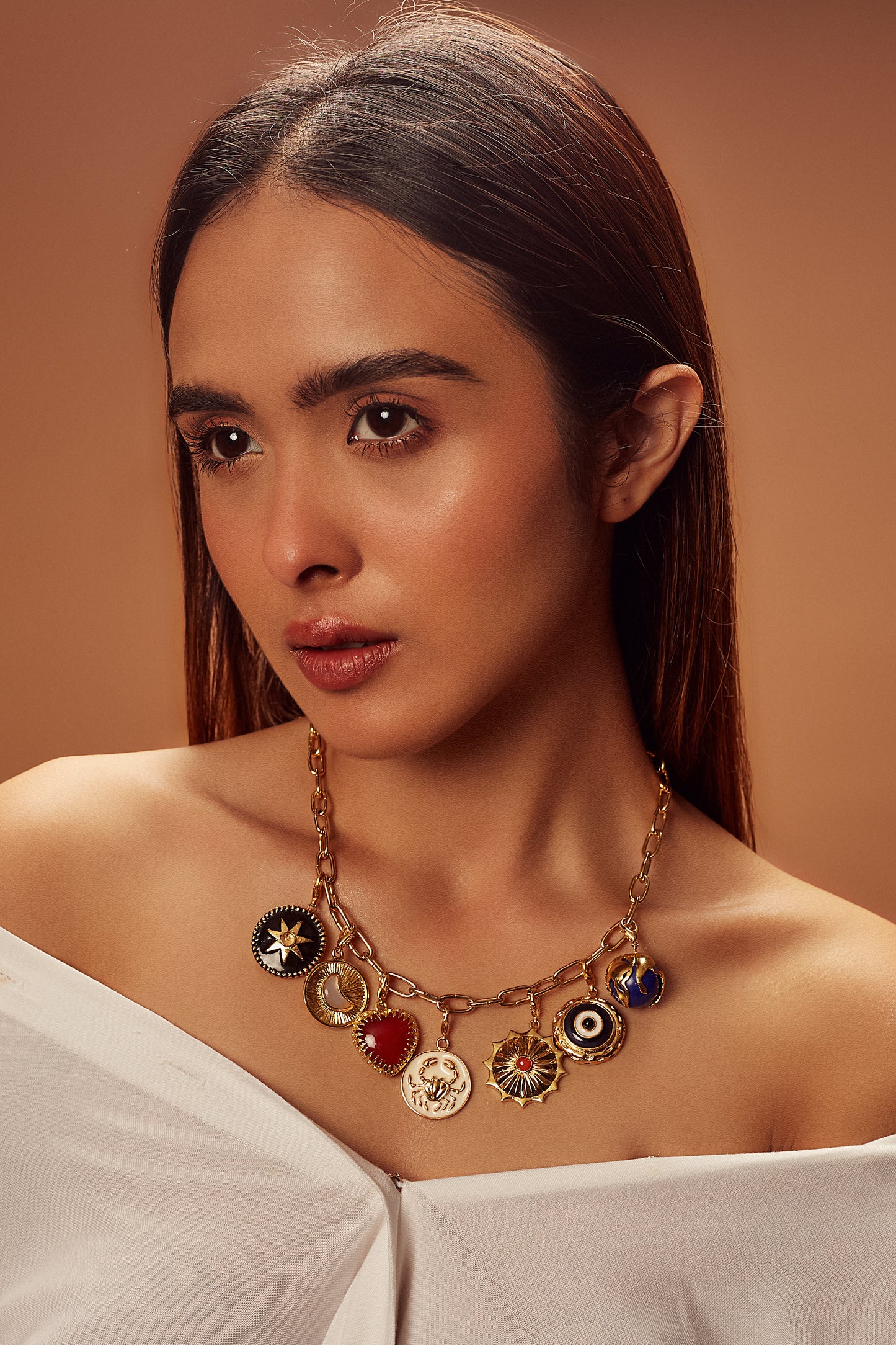 PEPSI KALWANI IN CHARMS NECKLACE