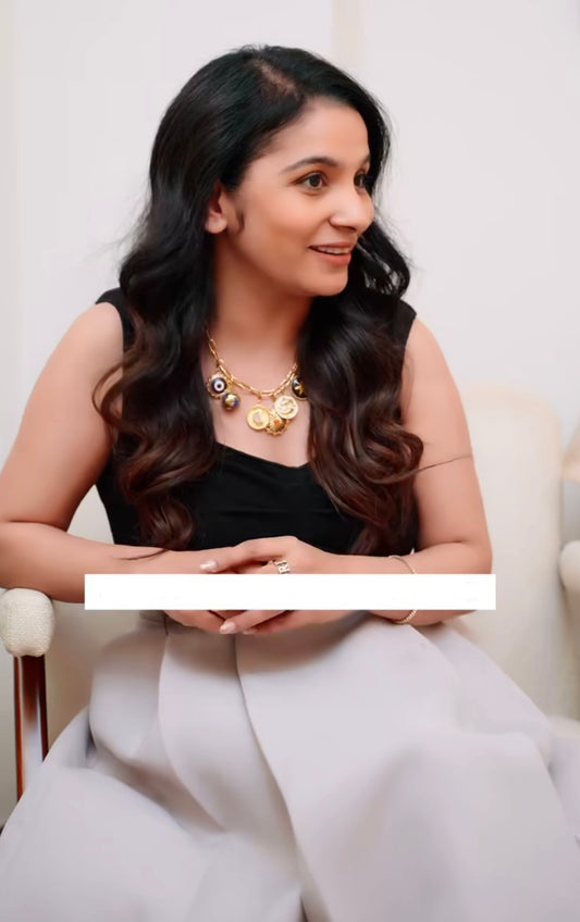 PEPSI KALWANI IN CHARMS NECKLACE
